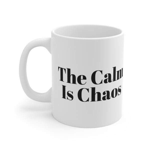 10969054281326581921_2048.jpeg The calm is chaos mug